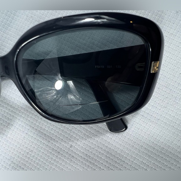 Fendi Black Sunglasses - look to be prescription bi-focal lens.